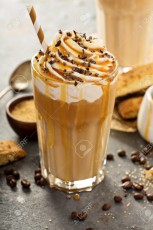 Iced caramel latte coffee in a tall glass