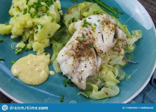isolated-blue-china-dish-codfish-fillet-poached-pointed-cabbage-mustard-sauce-mashed-potatoes-seasoned-chives-174864455.jpg