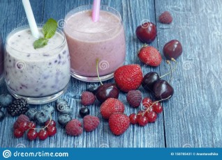 raspberry-strawberry-blueberry-smoothie-blue-wooden-background-milkshake-fresh-berries-berry-yogurt-blackberries-150785431.jpg