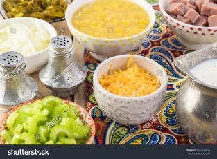 stock-photo-ingredients-for-mexican-fiesta-soup-cream-style-corn-potatoes-ham-onion-celery-chili-pepper-1342598810.jpg