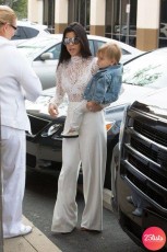Kim and Kourtney Kardashian Attend Sunday Service With North West and Penelope Disick in Paris